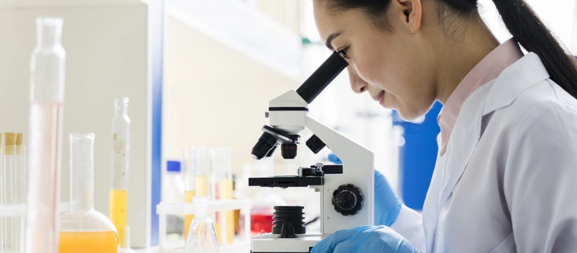 side-view-of-female-scientist-working-in-the-lab